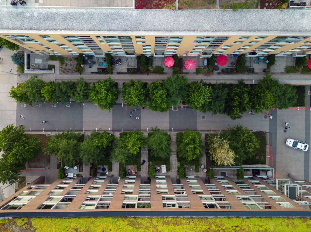 A bird's eye view of two apartment buildings.